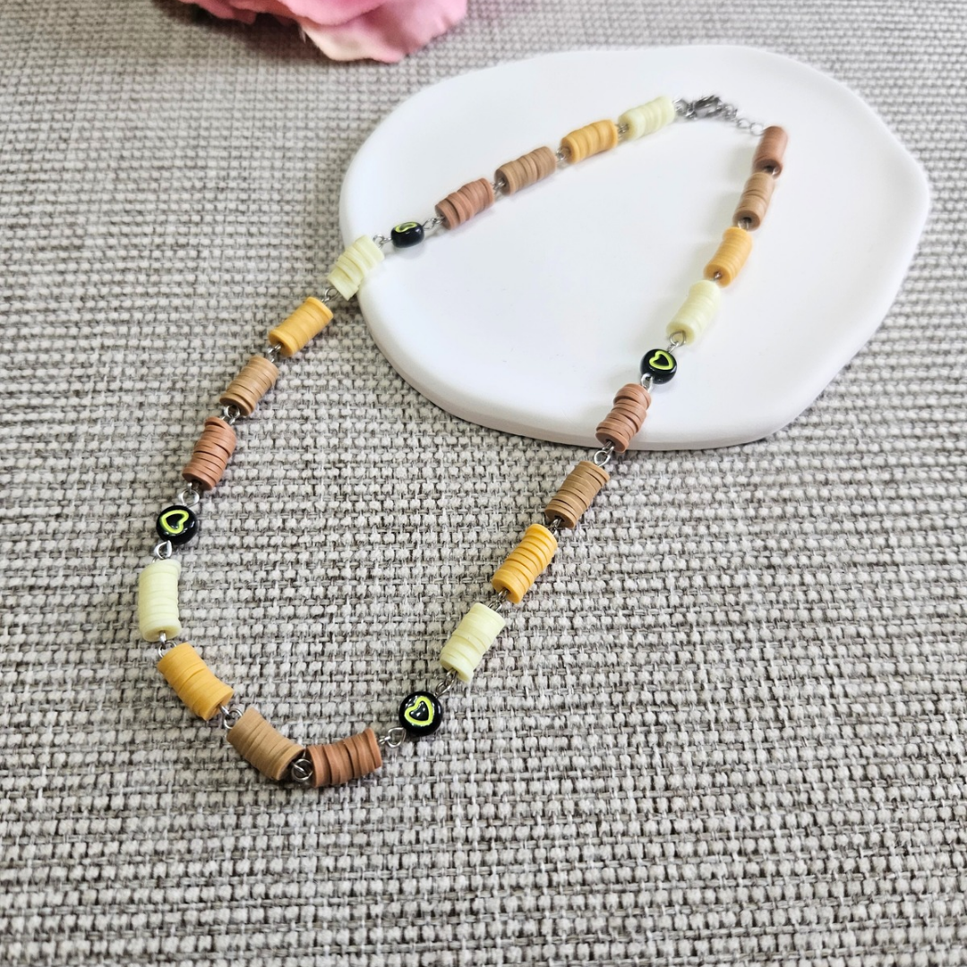 Collana Punto e Virgola con cuoricino in acciaio Giallo fluo