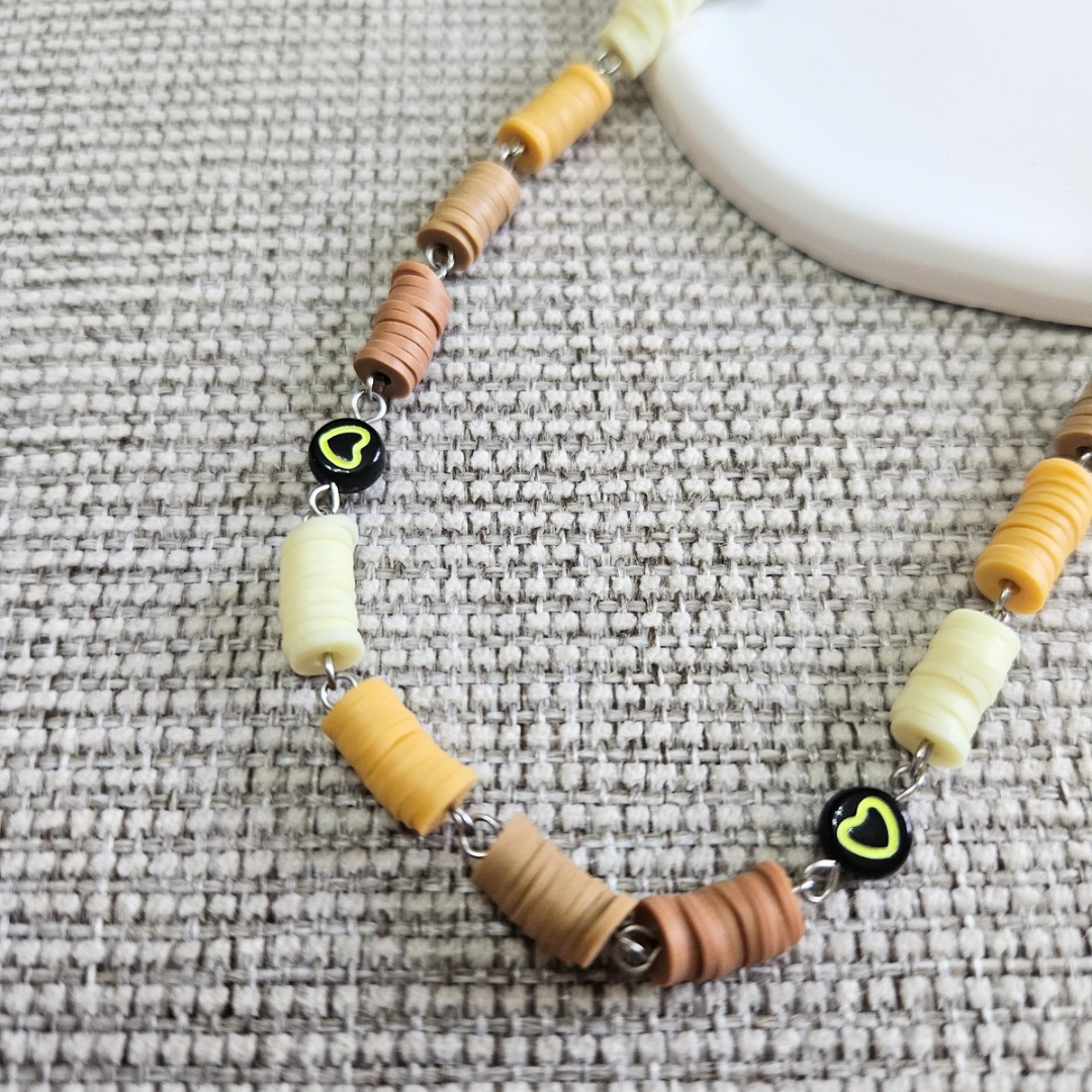 Collana Punto e Virgola con cuoricino in acciaio Giallo fluo